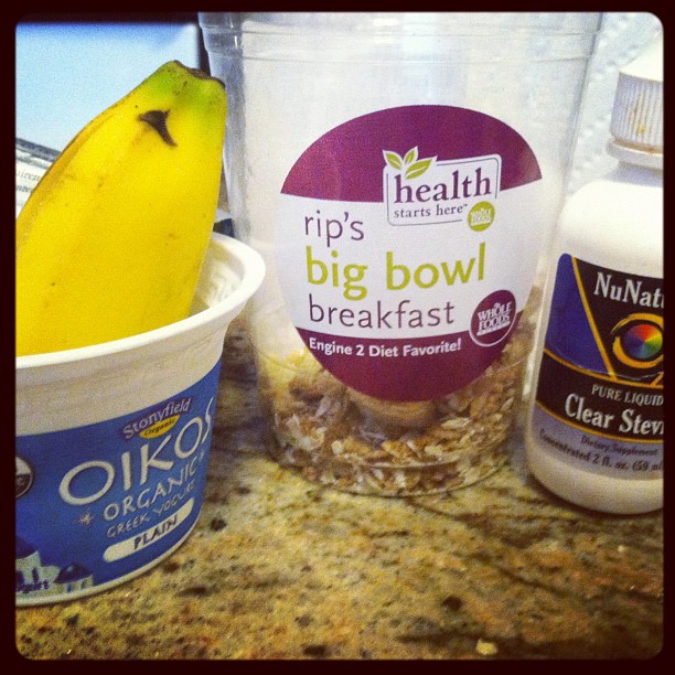 Today's breakfast was a combination of 1/2 a banana, Greek yogurt, stevia to sweeten, and handful of rips big bowl breakfast from WH as a granola alternative! #eatclean #breakfast #whatIeatinaday #inst